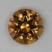 Lightly included, very transparent golden yellow round.  #889