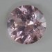 Lightly included baby pink round from Afghanistan.  #890