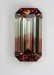 A great bi color, clear/reddish brown, in an emerald cut.  #893