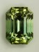 Dichroic, bright yellow green/bright green eye clean emerald cut.  #897