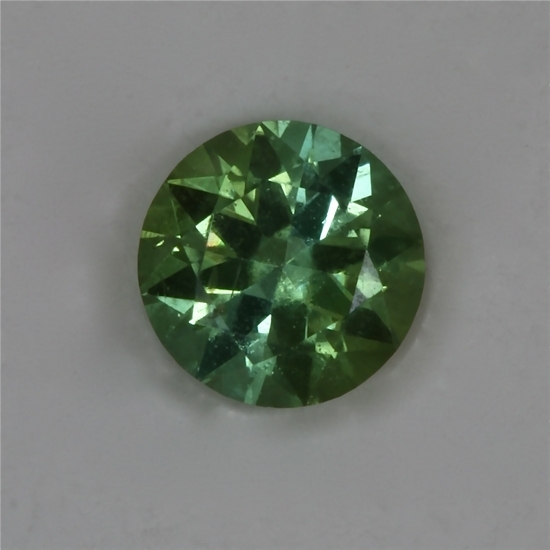 Nice bright, medium toned green dot of color.