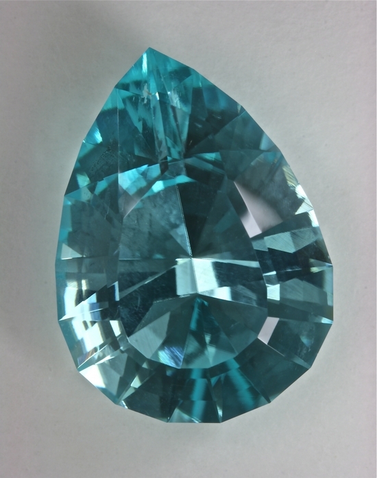 Large bright cyan blue, cuprian, pear shaped GEM.  #941