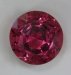 A larger medium toned bright orangsih pink with a uniform field of faint inclusions.  #924