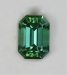 Smaller, bright blue green and dichroic, emerald cut.  #931