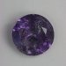 Included Laurellite, blue to purple color changer, cuprian, round.
