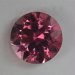 Rock solid medium toned and brightly colored pink round.  #955