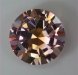 This pink with a touch of yellow green round has a modified crown.  #987