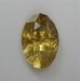 Moderately heavy inclusion impact the properties of this yellow oval.  #990