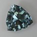 A blue oval teaming with inclusions, like life the sea.  #996