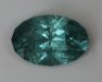 This medium toned, bluish oval has a diverse group of eye visible inclusions likelife in the sea.  #998