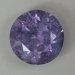 Moderately included cuprian Laurellite, round.  #999