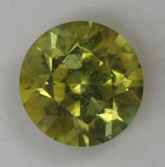 A great acid, yellow green gem with everything fine, droplet of color.  #72