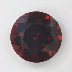 A medium dark brown with orange flash round.  #79