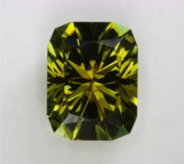 Olive green with not too much brown, Barion cushion cut.  #83