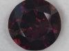 A brown droplet of color, that has violet flash in good lighting.  #68