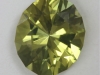 Very bright yellow with a wash of green, cuprian, oval.  #71