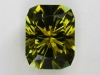 Olive green with not too much brown, Barion cushion cut.  #83