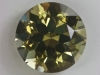 A bit toned down yellow with a wash of green, round.  #91