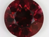 A beautiful brown red to red round.  #99