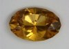 Vivid yellow oval with rich tone and one tiny inclusion away from being eye clean.  #1007