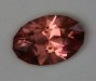 I am going with pink salmon for the color of this eye clean oval.  #1016