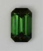 Fine classic tourmaline green emerald cut with darker ends.  #1017