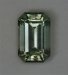 Very pale tan wash on a slightly included emerald cut.  #1018