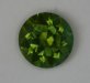 Great grass green color in an eye clean round.  #1019