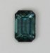 Smaller emerald cut with basically a blue nature, tinted with green.  #1020