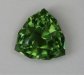 Medium toned grass green shield cut.  #1023