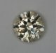 Small, lightly tone, wheat colored round.  #1034