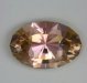 One mixed up pink/green step cut oval.  #1045