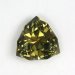 A muted uniformly colored, yellow green shield cut.  #1048