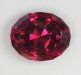 Larger, eye clean,red oval with a deep cut.  #1051