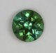 Included, Medium toned, blue green round.  #1056