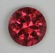 This orangish pin round has significant inclusion.  #1062