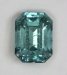 1Included non dichroic medium light toned emerald cut.  #1071
