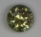 An unusual green/purple, modified standard round brilliant.  #1083