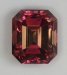 Great dichroic pink emerald cut.  #1086