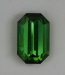 Bright classic tourmaline green in a closed ended emerald cut.  #1094