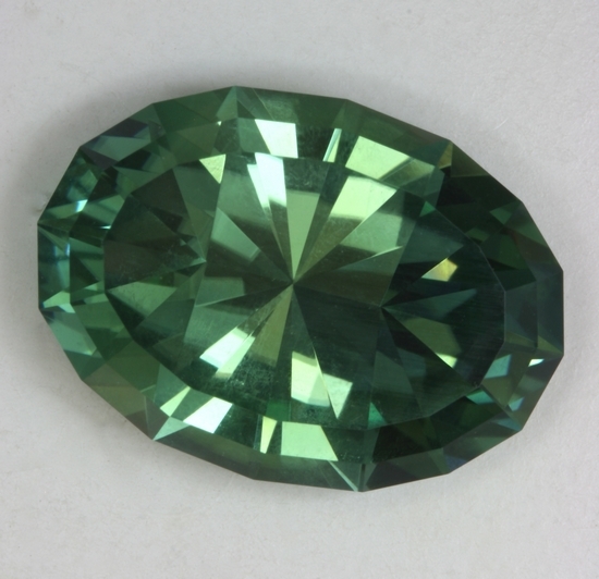 Excellent apple green non-dichroic oval, Mozambique