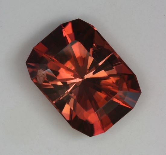 A great Barion cut with stepped crown, browned orange.