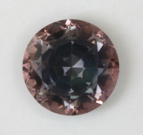 Gray peach deeply cut round, face up