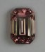 Nice peach with a pink shadow emerald cut.