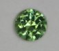 Medium toned, green dot of color.
