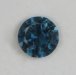A dark blue dot of color with limited flash.