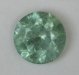 Moderately included minty green droplet of color.