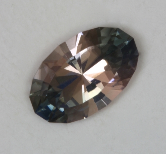 Oval with blue ends and a pink center.