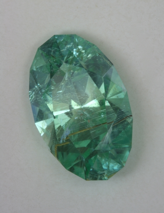 Included bright blue green oval