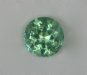 Medium light tone blue green dot of color.